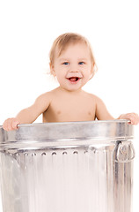 Image showing baby in trash can