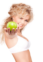 Image showing young beautiful woman with green apple