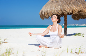 Image showing meditation on the beach