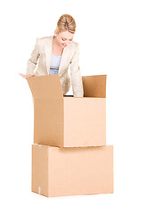 Image showing businesswoman with boxes