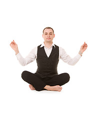 Image showing businessman sitting in lotus pose