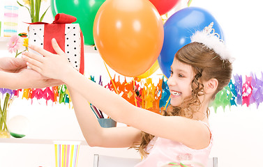 Image showing party girl with balloons and gift box