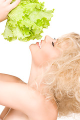 Image showing happy woman with lettuce