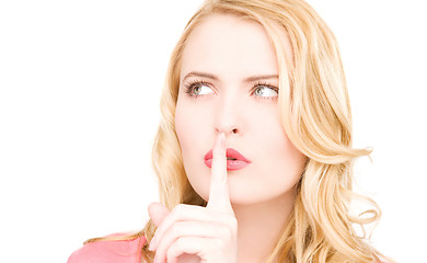 Image showing finger on lips