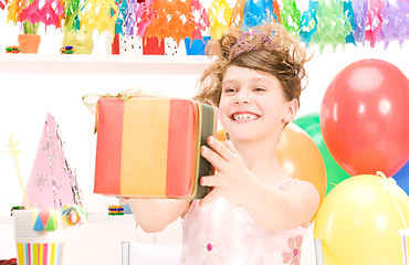 Image showing party girl with balloons and gift box