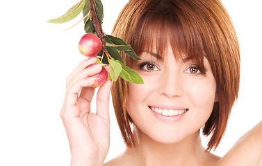 Image showing happy woman with apple twig