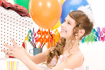 Image showing party girl with balloons and gift box