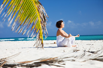 Image showing meditation on the beach