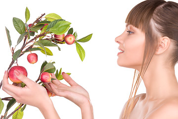 Image showing lovely woman with apple twig