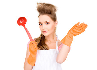 Image showing housewife with red ladle