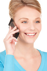 Image showing happy businesswoman with phone