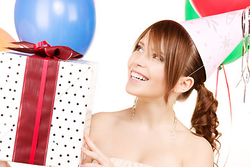 Image showing party girl with balloons and gift box