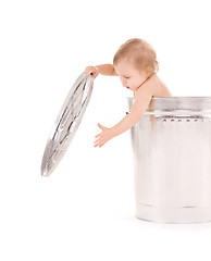 Image showing baby in trash can