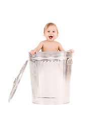 Image showing baby in trash can