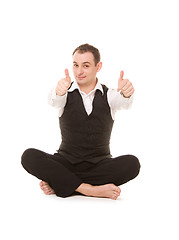 Image showing businessman sitting in lotus pose