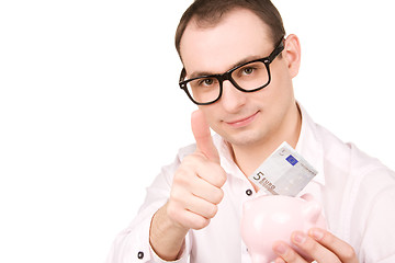 Image showing businessman with piggy bank and money