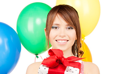 Image showing party girl with balloons and gift box