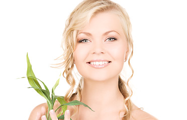 Image showing woman with bamboo