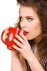 Image showing young attractive woman in the kitchen