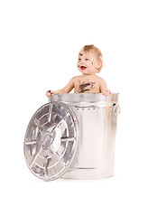 Image showing baby in trash can