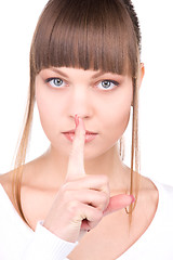 Image showing finger on lips