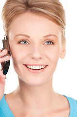 Image showing happy businesswoman with phone