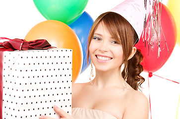 Image showing party girl with balloons and gift box