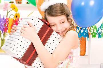 Image showing party girl with balloons and gift box