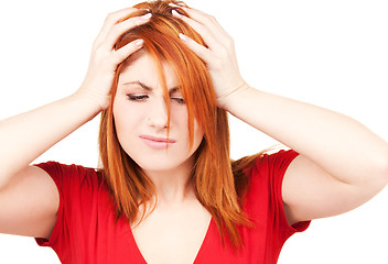 Image showing unhappy redhead woman