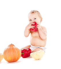 Image showing baby boy with vegetables