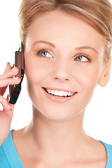 Image showing happy businesswoman with phone