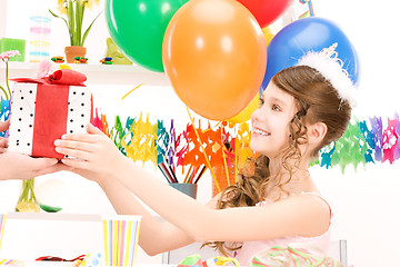 Image showing party girl with balloons and gift box