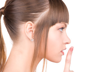 Image showing finger on lips