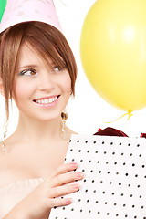 Image showing party girl with balloons and gift box