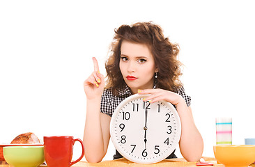 Image showing young attractive woman in the kitchen