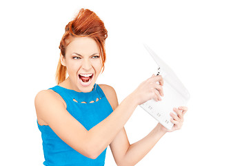 Image showing angry woman with laptop computer