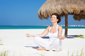 Image showing meditation on the beach