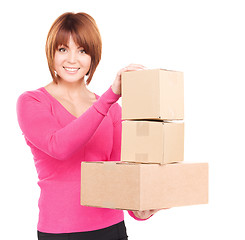 Image showing businesswoman with parcels