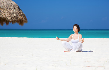 Image showing meditation on the beach