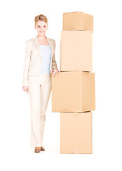 Image showing businesswoman with boxes