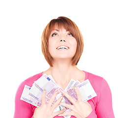 Image showing happy woman with money