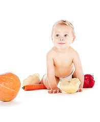 Image showing baby boy with vegetables