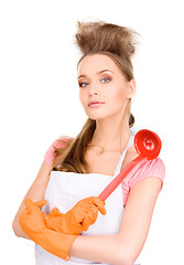 Image showing housewife with red ladle