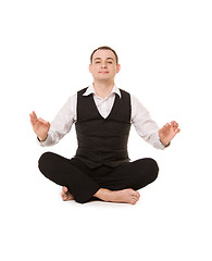 Image showing businessman sitting in lotus pose