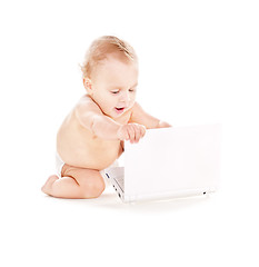 Image showing baby boy in diaper with laptop computer