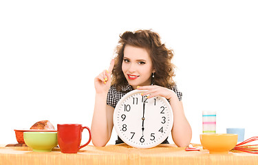 Image showing young attractive woman in the kitchen