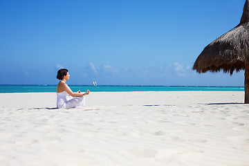 Image showing meditation on the beach