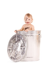 Image showing baby in trash can