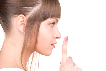 Image showing finger on lips