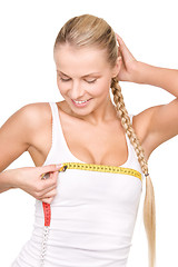 Image showing beautiful woman with measure tape